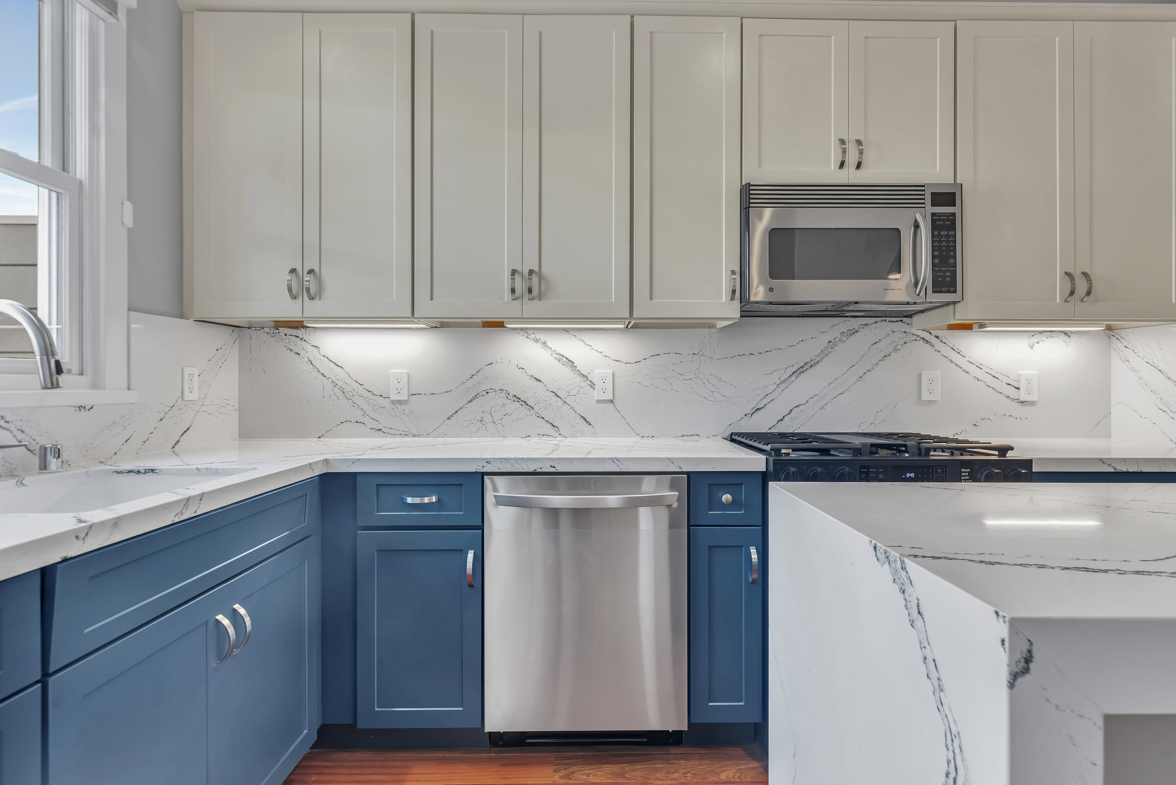 Full-home remodel kitchen with navy island, San Francisco — We Do Construction