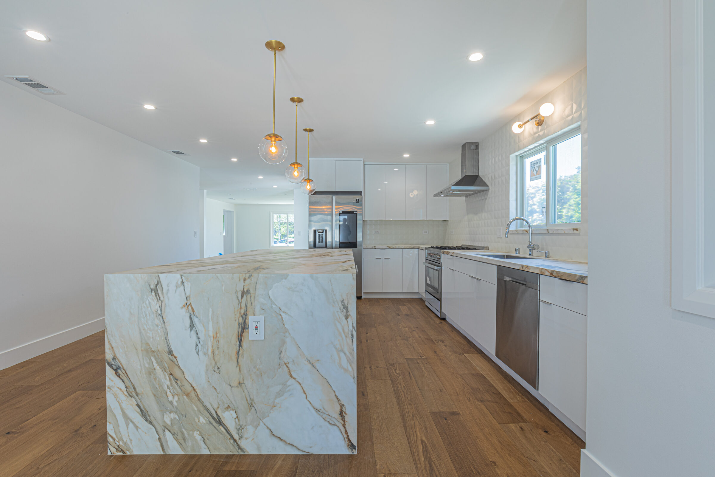 Book-matched stone island kitchen, Pacific Heights — We Do Construction
