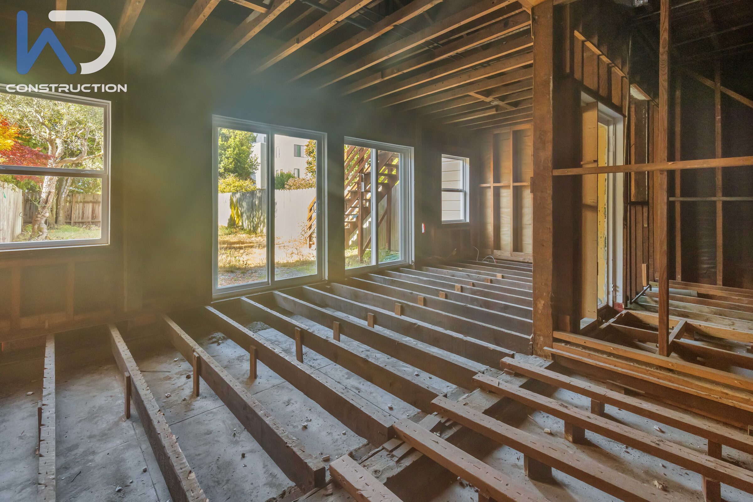 Structural framing on a We Do Construction San Francisco project — the seismic scope a Victorian renovation bundles behind preserved walls