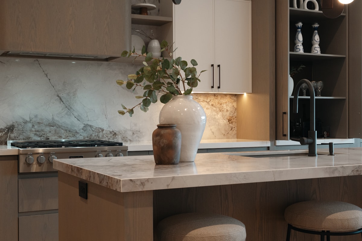 Warm marble and wood kitchen remodel by We Do Construction, Presidio Heights