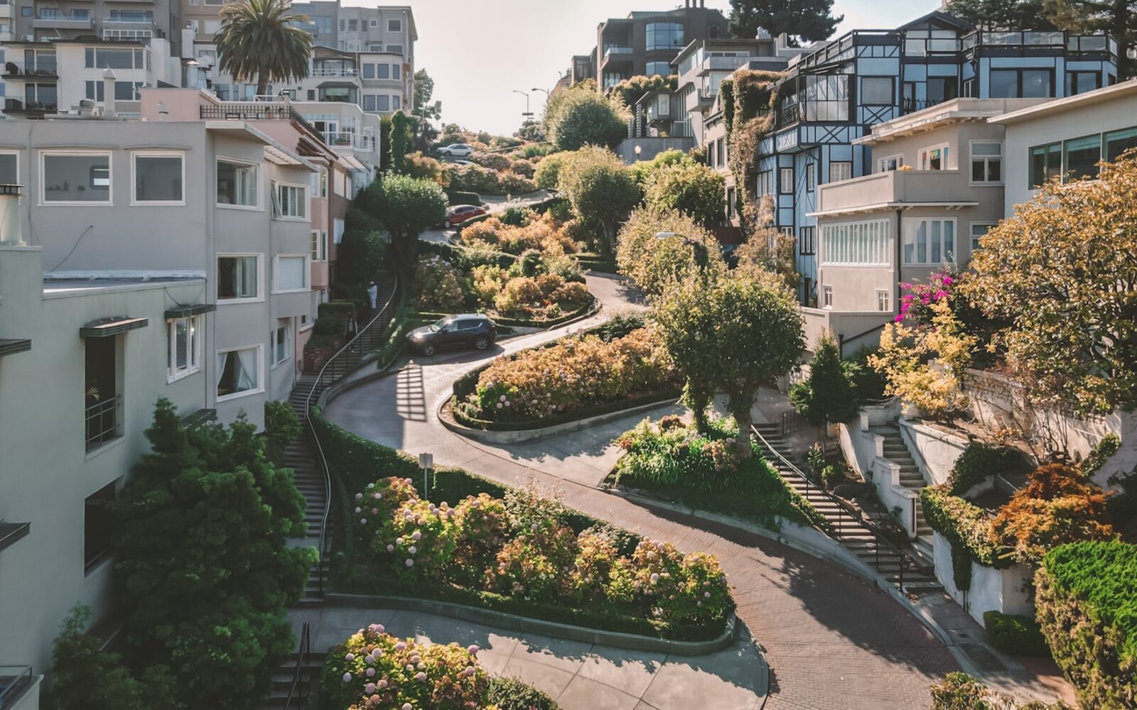 Hillside whole-home renovation in Russian Hill, San Francisco — stepped facade on a steep lot by We Do Construction